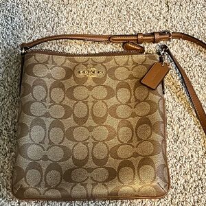 Brown Coach crossbody purse